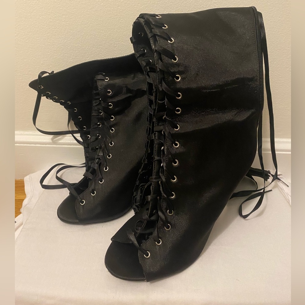 Thigh high lace up boot